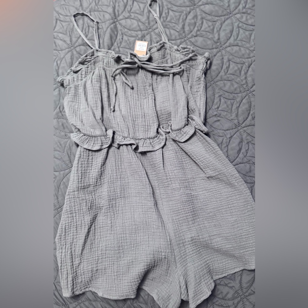 Large romper. New with tags.